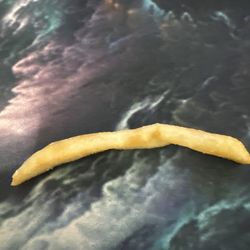 McDonald's - French Fries with eyelash on it