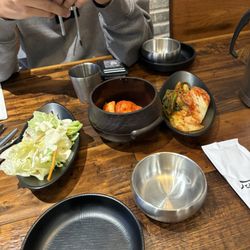 The Jinkook - This is the sides we got, the radishes were really good and the kimchi was great.