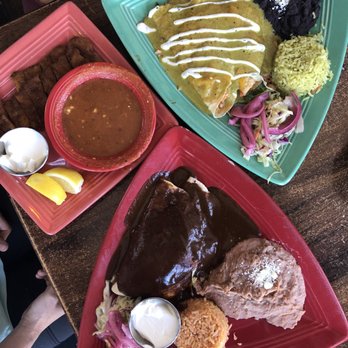 Maggie's Blue Rose - Left: Calamari, top: lobster enchiladas, bottom: duck enchiladas - Mexican Near Me - Avalon, California Maggie's Blue Rose - Left: Calamari, top: lobster enchiladas, bottom: duck enchiladas - Mexican Near Me - Avalon, California