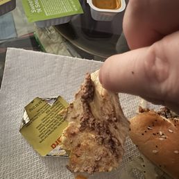 The wax paper cooked into my BIG ARCH patty.