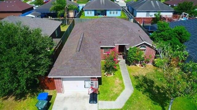 Slide of Vasquez Roofing Company