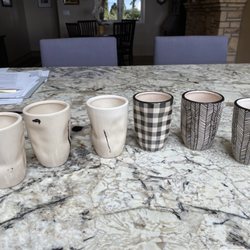 Paper Jazz - Hlasses on left have glaze washed off in dishwasher. Glasses on right retained glaze.