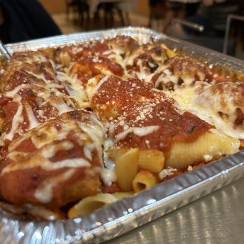 Mannino's - Stuffed shells, chicken parmigiana and meat balls on top of baked ziti - Italian Near Me - Tamarac, Florida Mannino's - Stuffed shells, chicken parmigiana and meat balls on top of baked ziti - Italian Near Me - Tamarac, Florida