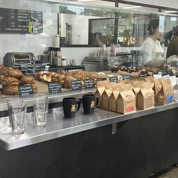 James Coffee - Bakery Display and cashier with windows that look back to where the magic is made - Coffee & Tea Near Me - Escondido, California James Coffee - Bakery Display and cashier with windows that look back to where the magic is made - Coffee & Tea Near Me - Escondido, California