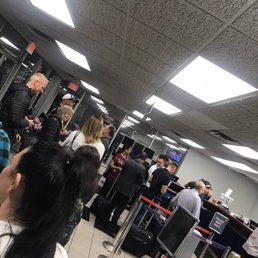 Long line. Two people working. Zero Fs given. Not by the counter staff. Not by Dollar Rental Car. AVOID this place like the plague!!