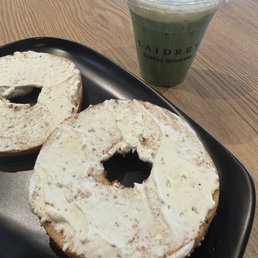 Everything bagel with cream cheese and a matcha latte