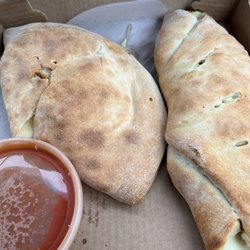 Bella Mia Pizzeria - Chicken Calzone and Spinach Roll
