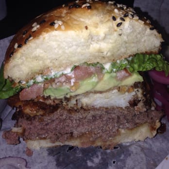 EAT - Half of a surf n turf burger - Food Delivery Services Near Me
