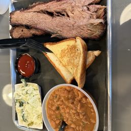 Beef brisket special. Seasoned and cooked to perfection. Coleslaw,homemade, excellent. Bean were average, I would give a definite 5. Beef brisket special. Seasoned and cooked to perfection. Coleslaw,homemade, excellent. Bean were average, I would give a definite 5.