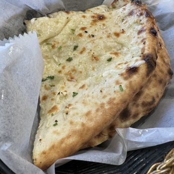 Everest Curry Bar & Grill - This was our favorite version of naan. Seriously,stuffed bread with garlic and cheese, and you know it's going to be great! - Indian Near Me - Houston, Texas Everest Curry Bar & Grill - This was our favorite version of naan. Seriously,stuffed bread with garlic and cheese, and you know it's going to be great! - Indian Near Me - Houston, Texas
