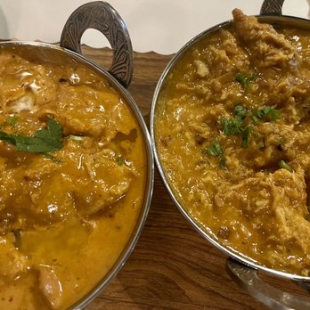 Bombay Palace - *L: Chicken Makhani (Butter)  *R: Chicken Coconut Kurma Both are so equally delicious Can be made Mild, Medium, Hot, very Hot - Indian Near Me - Murray, Utah