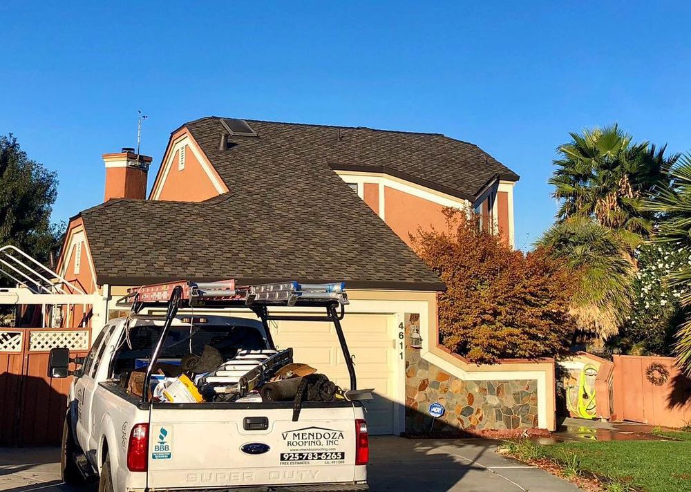 Slide of V Mendoza Roofing