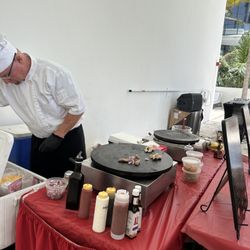 CrêpeMaker - Christopher at work making crepes.