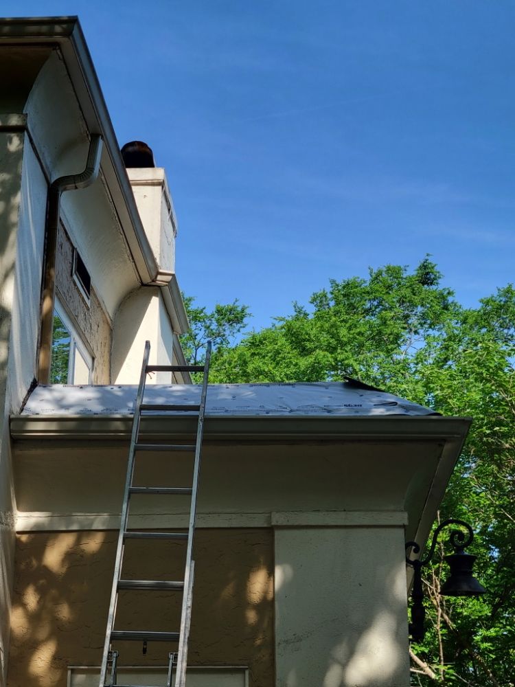 Slide of Benitez Roofing