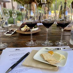 The Hess Collection Winery - Wine tasting in outside garden area