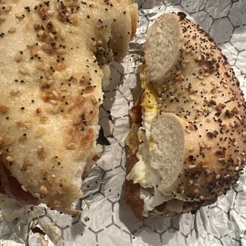 Strathmore Bagels - Bacon, egg and pepper Jack cheese on everything bagel with hot sauce and ketchup. - Bagels Near Me - Ronkonkoma, New York Strathmore Bagels - Bacon, egg and pepper Jack cheese on everything bagel with hot sauce and ketchup. - Bagels Near Me - Ronkonkoma, New York