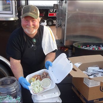 Lonny Boy's Barbeque - Lonny smiles for my camera, as he showcases my dinner.  As a Navy veteran, I appreciate his generosity. - Barbeque Near Me - Hurricane, Utah