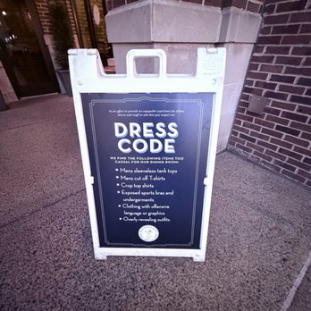 Moondance Grill - Dress code sign - New American Near Me - Germantown, Tennessee