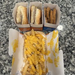 FRENCH FRIES WITH CHEESE, ORIGINAL SLIDER, CHICKEN RINGS. FRENCH FRIES WITH CHEESE, ORIGINAL SLIDER, CHICKEN RINGS.