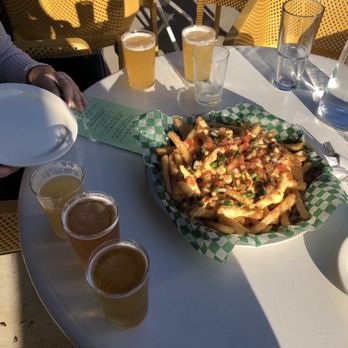 Triple Taproom & Kitchen - Loaded fries and beer flights - Breweries Near Me - Milwaukee, Wisconsin Triple Taproom & Kitchen - Loaded fries and beer flights - Breweries Near Me - Milwaukee, Wisconsin