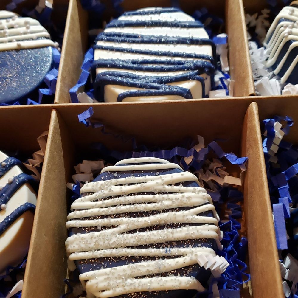 Dezzy's Delectables - a box of decorated cookies - Desserts Near Me Dezzy's Delectables - a box of decorated cookies - Desserts Near Me