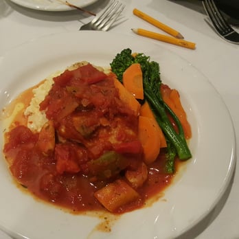 The Dinner Detective - a plate of food on a table - Dinner Theater Near Me - Orange, California