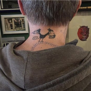 Quimby's Bookstore NYC - Quimbys logo tattooed on owners neck - Bookstores Near Me - Brooklyn, New York