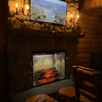The Cabin - Cozy fireplace with TV above - Cocktail Bars Near Me - Sacramento, California The Cabin - Cozy fireplace with TV above - Cocktail Bars Near Me - Sacramento, California