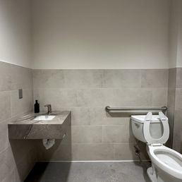 Clean minimalist restroom; 1 of 2 gender neutral on site. Clean minimalist restroom; 1 of 2 gender neutral on site.