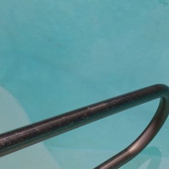 Gutierrez Tree Care 1 - Pool floor staining visible from the steps into the pool. - Tree Services Near Me - Visalia, California Gutierrez Tree Care 1 - Pool floor staining visible from the steps into the pool. - Tree Services Near Me - Visalia, California