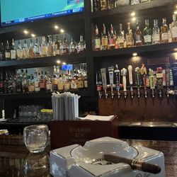 The World Famous Cigar Bar - Bar, Tv, and Cigar.