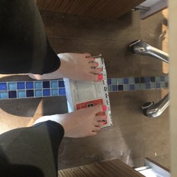 Making me get nails painted with feet on a box Making me get nails painted with feet on a box