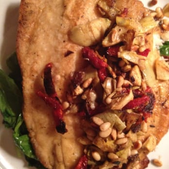 Brio Italian Grille - Pan seared Trout over a bed of crispy red potatoes and sautéed shrimp with roasted artichokes, sundries tomato, pine nuts - Italian Near Me - Cherokee, North Carolina Brio Italian Grille - Pan seared Trout over a bed of crispy red potatoes and sautéed shrimp with roasted artichokes, sundries tomato, pine nuts - Italian Near Me - Cherokee, North Carolina
