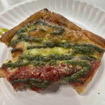 Fratelli’s Pizza Ventnor - A corner slice of the grandma's pie dribbled in the amazing fresh pesto. What an incredible touch. - Pizza Near Me - Ventnor City, New Jersey