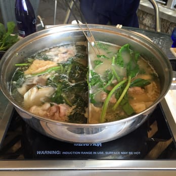 Shabu Restaurant - Hybrid broths: tonkotsu broth and salmon with cilantro, ginger - mixed both broths. Yum!! - Japanese Near Me - Quincy, Massachusetts Shabu Restaurant - Hybrid broths: tonkotsu broth and salmon with cilantro, ginger - mixed both broths. Yum!! - Japanese Near Me - Quincy, Massachusetts