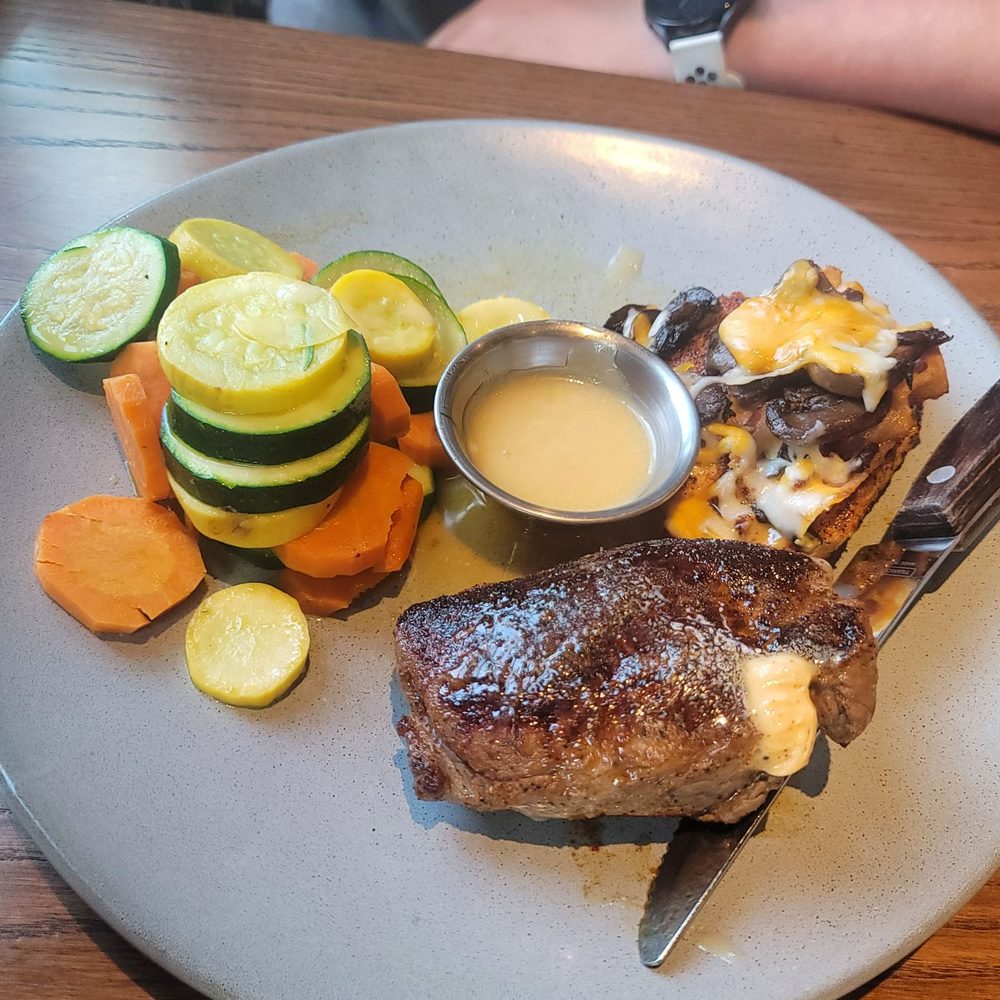 Outback Steakhouse - Combo of chicken and steak with mixed veggies - Steakhouses Near Me - Schaumburg, Illinois Outback Steakhouse - Combo of chicken and steak with mixed veggies - Steakhouses Near Me - Schaumburg, Illinois