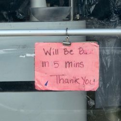 Olympia Cleaners - This is the message that identified that the store would be unattended for 15 minutes. The 1 is a faint blue, but it is still visible.