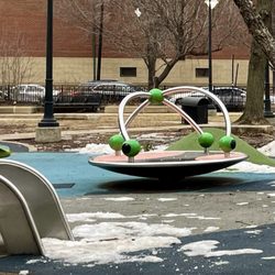 Coliseum Park - The merry-go-round. Those are olives, right? :-)