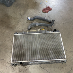 Replaced the above 20 year radiator with a new OEM. Good job Ceasar! Replaced the above 20 year radiator with a new OEM. Good job Ceasar!