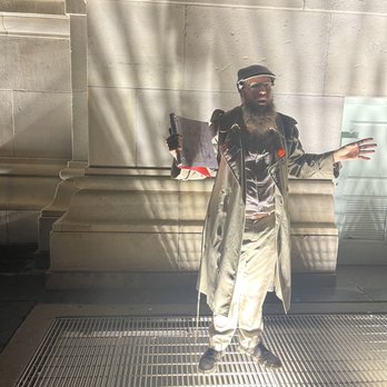 Haunted Manhattan - Our tour guide ending the tour in dramatic lighting - Tours Near Me Haunted Manhattan - Our tour guide ending the tour in dramatic lighting - Tours Near Me