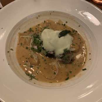 The Dearborn - Decadent Veal cheeks with lobster ravioli & broth with basil foam - get this dish! - New American Near Me - Chicago, Illinois