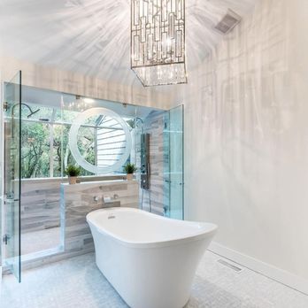 DC Tile and Stone - a bathtub in a bathroom - General Contractors Near Me