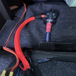 Stereo 1 Shop - Old 4 GA CCA wiring (orange) still present
