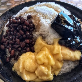 SnoMo - Purity shaved ice with dark brown syrup topping with adzuki bean, egg pudding and grass jelly. - Bubble Tea Near Me - Lakeway, Texas SnoMo - Purity shaved ice with dark brown syrup topping with adzuki bean, egg pudding and grass jelly. - Bubble Tea Near Me - Lakeway, Texas