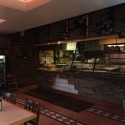 Suzy's Pizzeria & Spanish Restaurant. - Nice seating area .