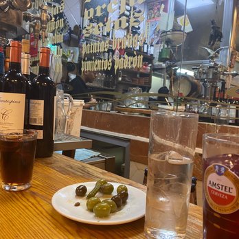 Casa Toni - Did not took a lot of pics but you have to order two dishes without a doubt; the "Orejas a la plancha" and the "Chipirones a la plancha". - Tapas/Small Plates Near Me - Madrid, M