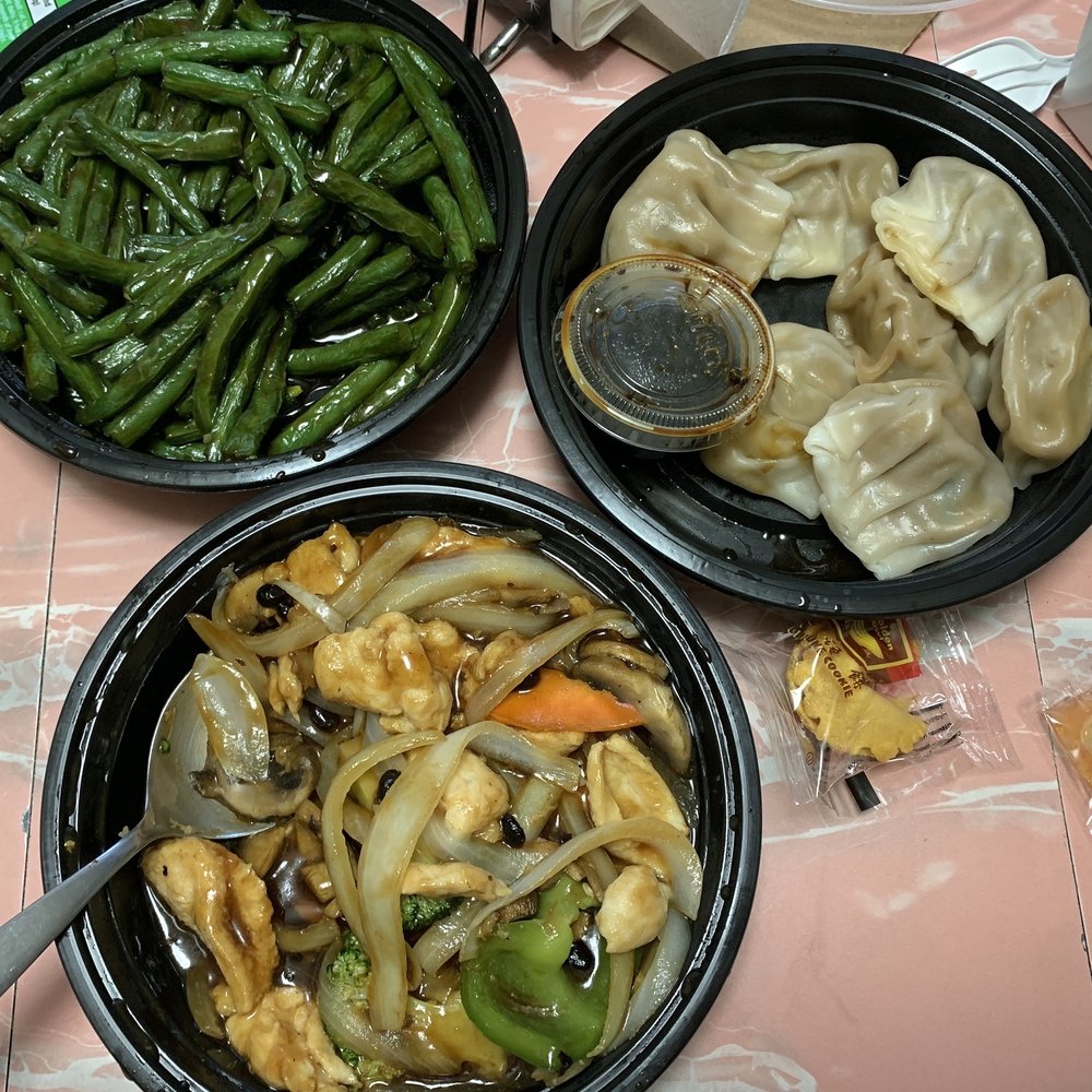 Sautéed string beans, chicken in black bean sauce, steamed pork dumplings. YUM!!