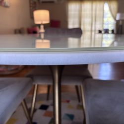 A+ Glass & Mirror - Side view of the custom frosted glass table top to protect my marble table.