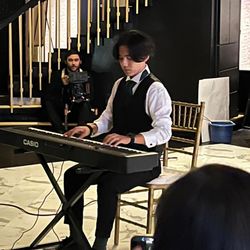 VENUE 833 - My little brother playing Canon in D for us (bride & groom) at reception/dinner time.