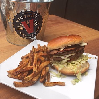 Victory Beer Hall - Brisket Burger with the hand cut fries. - Bars Near Me - Philadelphia, Pennsylvania Victory Beer Hall - Brisket Burger with the hand cut fries. - Bars Near Me - Philadelphia, Pennsylvania